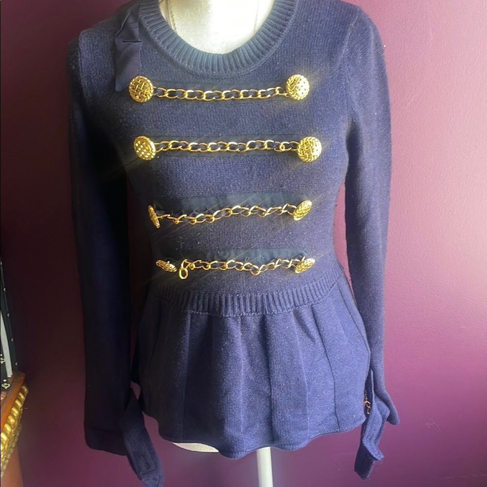 Elegant Navy Sweater with Gold Chain Details